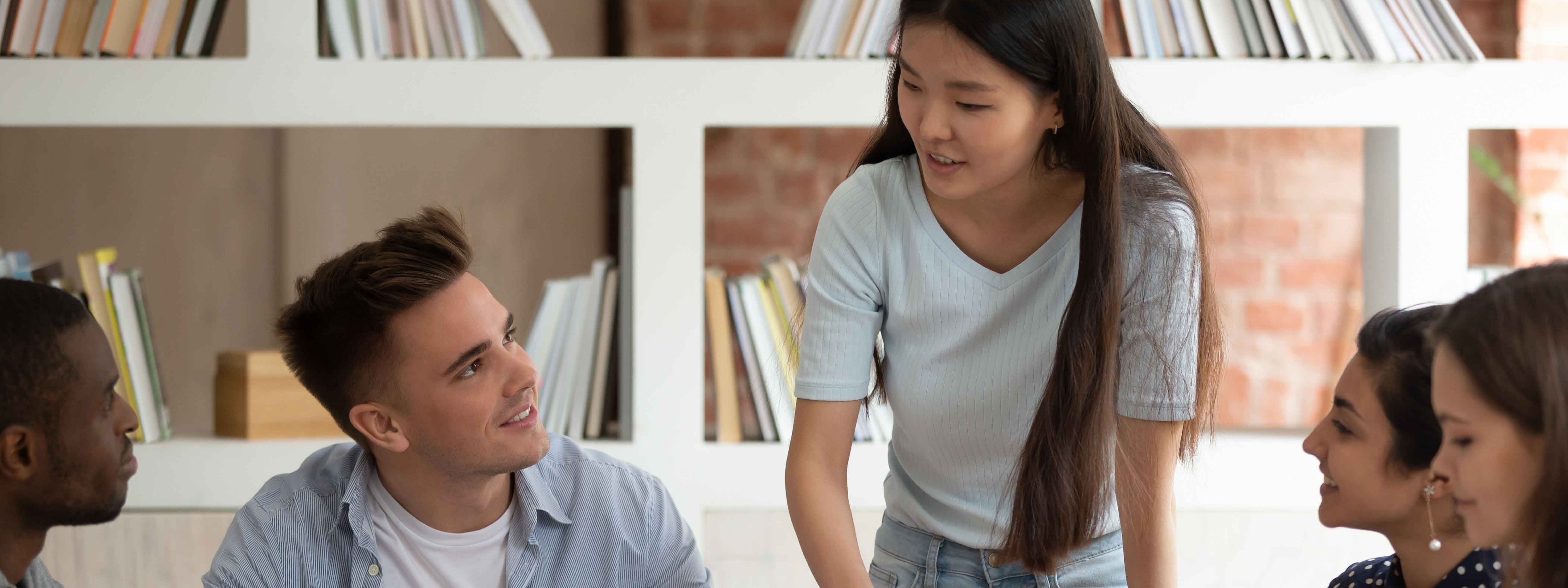 person presenting to colleagues